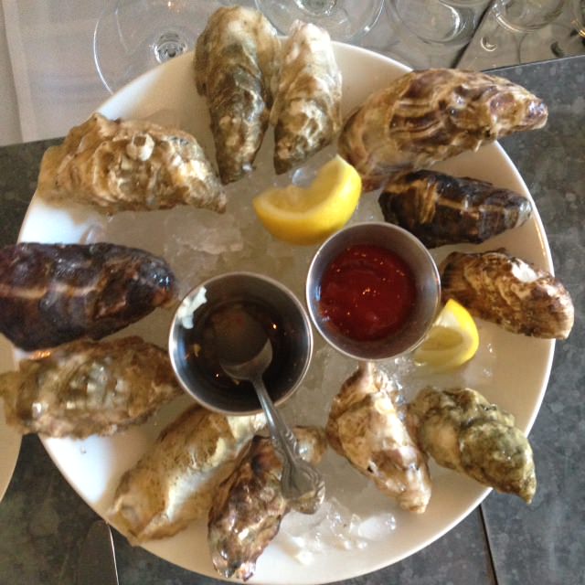 oysters on the half shell dish at Bar Crudo Happy Hour