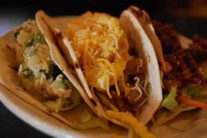 best places to eat in los angeles cheap is cheesy breakfast tacos on a plate