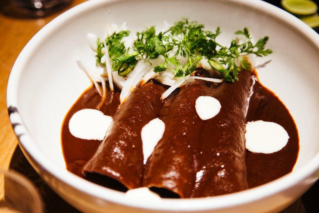 enmoladas mole enchiladas on a flatiron food tour in NYC