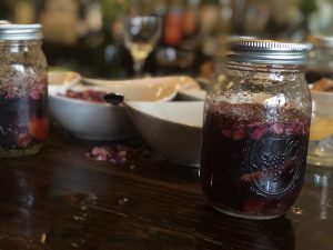 mason jar of homemade vermouth on a hands on culinary activity