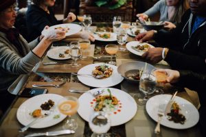 people eating at luxury food tour celebrate private culinary events