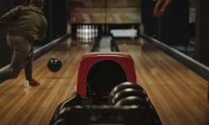 bowling and game for entertaining clients in NYC