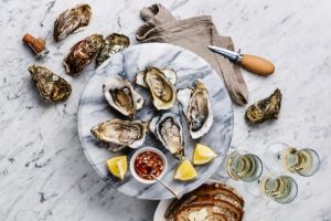 virtual oyster shucking class for virtual team building ideas to celebrate kentucky derby