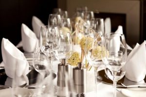 foodie-approved-tours-nyc-michelin-star-restaurant-table-set-with-glasses