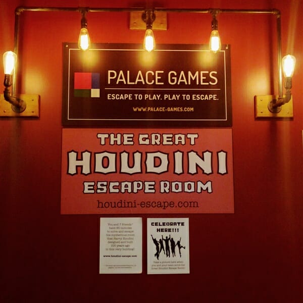 Sign for Palace games escape room for team building games for adults
